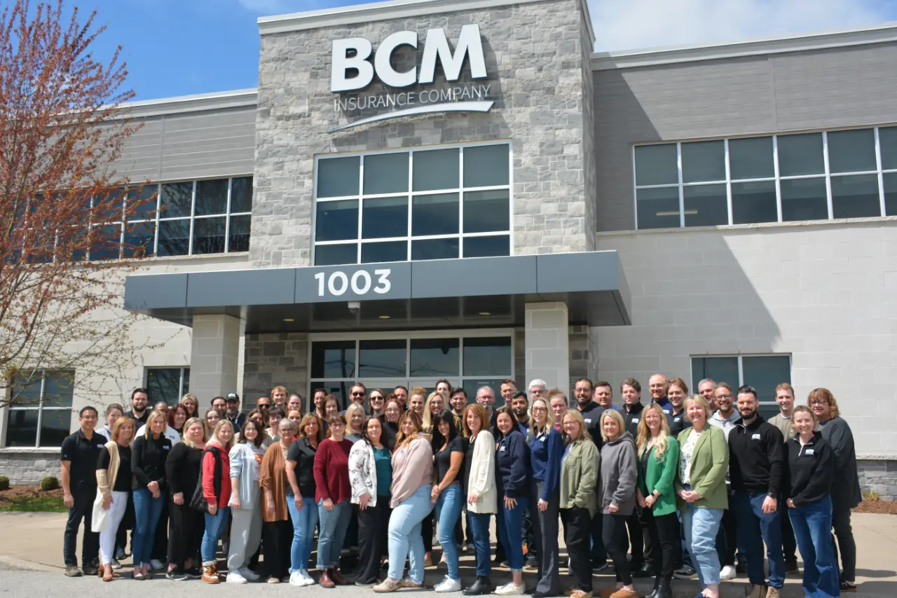 BCM Insurance staff gathered outside the head office at 1003 Niagara Street in Welland